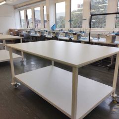 White laminate top cutting table